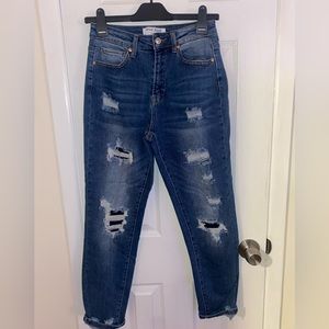 Wax ripped skinny jeans